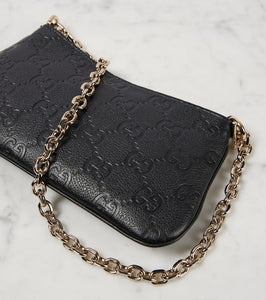 Gucci GG Super Mini debossed leather shoulder bag
