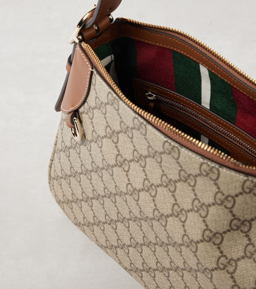 Gucci GG Canvas Medium leather-trimmed shoulder bag