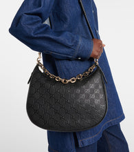 Gucci GG Medium debossed leather shoulder bag