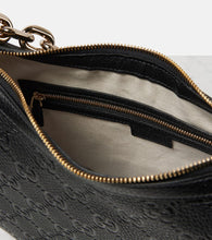 Gucci GG Medium debossed leather shoulder bag