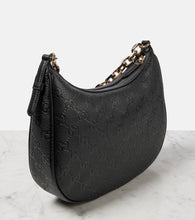 Gucci GG Medium debossed leather shoulder bag