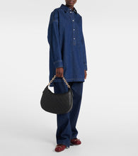 Gucci GG Medium debossed leather shoulder bag