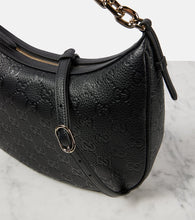 Gucci GG Medium debossed leather shoulder bag