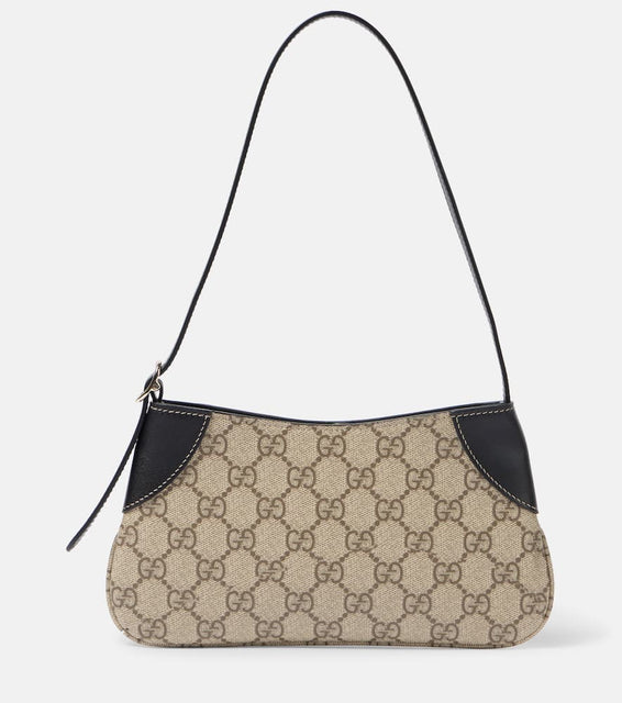 Gucci GG Canvas Super Mini shoulder bag. Shop Gucci Shoulder Bags for women now.