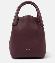 Loro Piana Bale Mini leather shoulder bag. Shop Loro Piana Top-Handle Bags for women now.