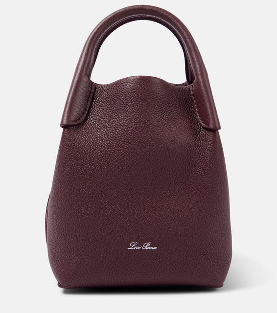 Loro Piana Bale Mini leather shoulder bag. Shop Loro Piana Top-Handle Bags for women now.