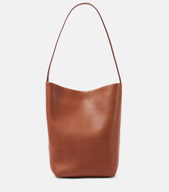 The Row Park N/S Medium leather tote bag. Shop The Row Shoulder Bags for women now.