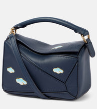Loewe Puzzle Mini leather shoulder bag. Shop Loewe Top-Handle Bags for women now.