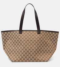 Gucci Totissima Medium leather-trimmed tote bag. Shop Gucci Tote Bags for women now.