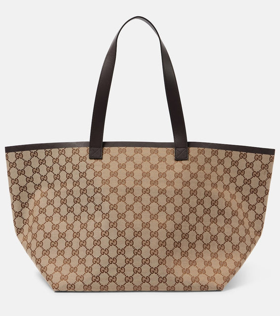 Gucci Totissima Medium leather-trimmed tote bag. Shop Gucci Tote Bags for women now.