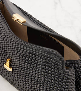 Toteme T-Lock woven leather clutch