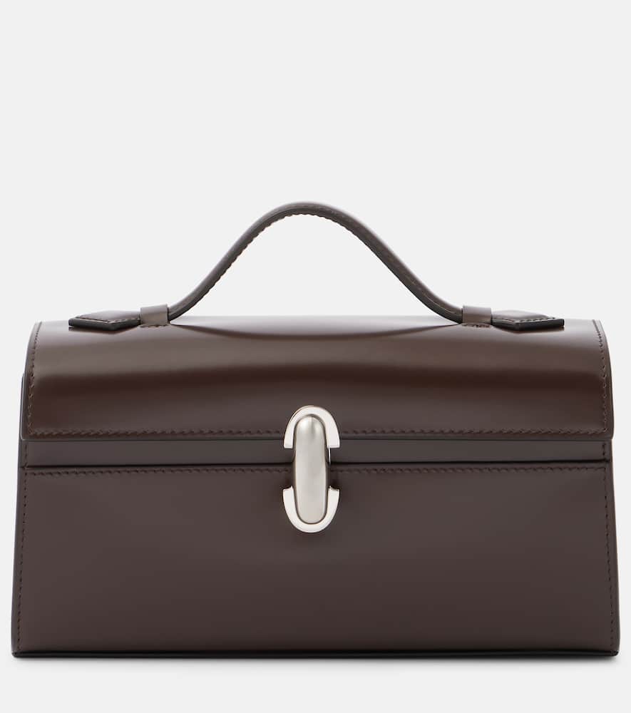 Savette Symmetry Pochette leather tote bag. Shop Savette Top-Handle Bags for women now.