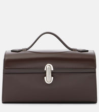 Savette Symmetry Pochette leather tote bag. Shop Savette Top-Handle Bags for women now.