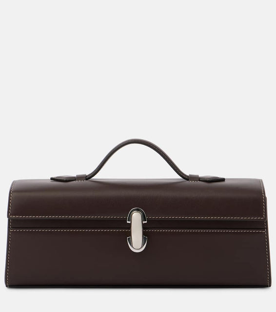 Savette Symmetry Pochette Slim leather tote bag. Shop Savette Top-Handle Bags for women now.