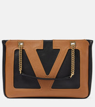 Valentino Garavani Viva Superstar Small leather shoulder bag. Shop Valentino Garavani Shoulder Bags for women now.