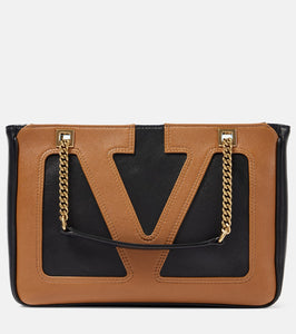 Valentino Garavani Viva Superstar Small leather shoulder bag. Shop Valentino Garavani Shoulder Bags for women now.