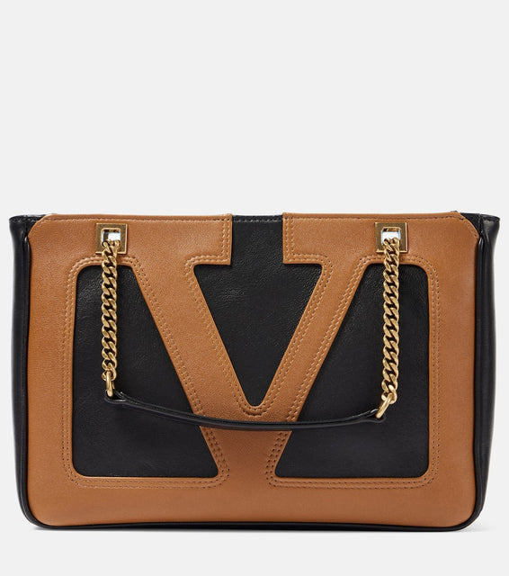 Valentino Garavani Viva Superstar Small leather shoulder bag. Shop Valentino Garavani Shoulder Bags for women now.