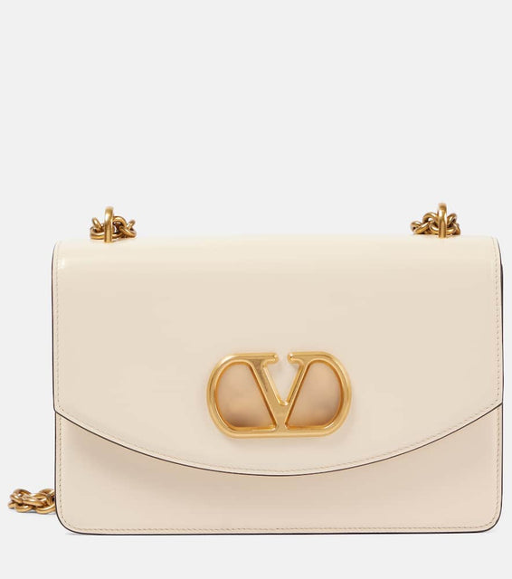 Valentino Garavani Vain Medium leather shoulder bag. Shop Valentino Garavani Shoulder Bags for women now.