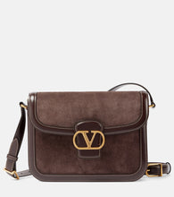 Valentino Garavani 9to5 Medium suede shoulder bag. Shop Valentino Garavani Shoulder Bags for women now.