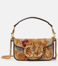 Valentino Garavani Loc√É¬≤ Small embroidered shoulder bag. Shop Valentino Garavani Top-Handle Bags for women now.