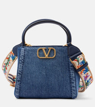 Valentino Garavani Alltime Small denim tote bag. Shop Valentino Garavani Top-Handle Bags for women now.
