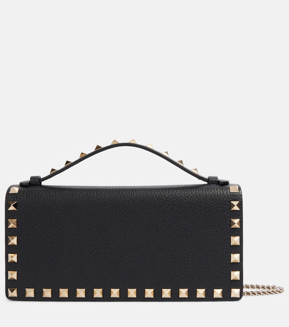 Valentino Garavani Rockstud leather wallet on chain. Shop Valentino Garavani Top-Handle Bags for women now.