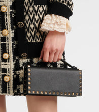 Valentino Garavani Rockstud leather wallet on chain