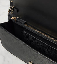 Valentino Garavani Rockstud leather wallet on chain