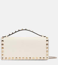 Valentino Garavani Rockstud leather wallet on chain. Shop Valentino Garavani Top-Handle Bags for women now.
