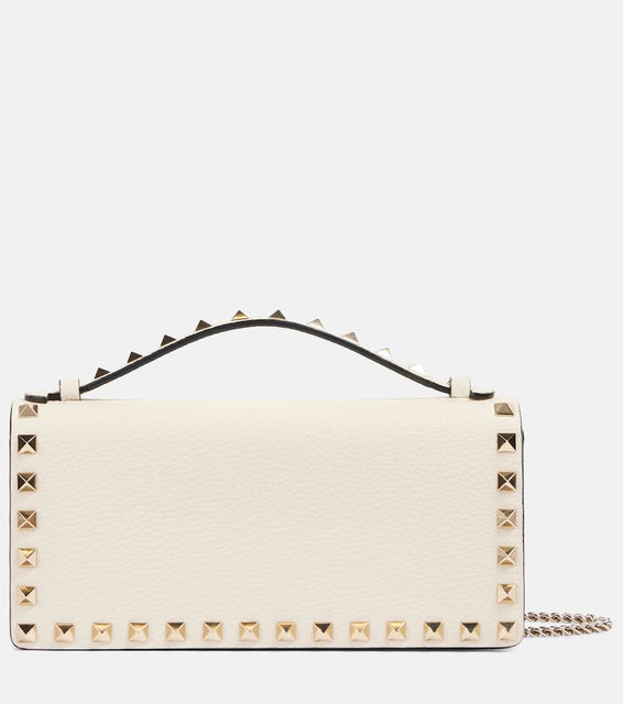 Valentino Garavani Rockstud leather wallet on chain. Shop Valentino Garavani Top-Handle Bags for women now.