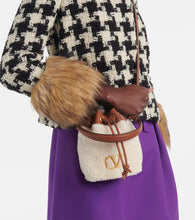 Valentino Garavani VLogo Signature shearling bucket bag