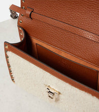 Valentino Garavani Rockstud Small shearling shoulder bag