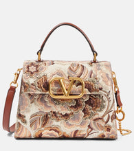 Valentino Garavani VSling Small jacquard shoulder bag. Shop Valentino Garavani Top-Handle Bags for women now.