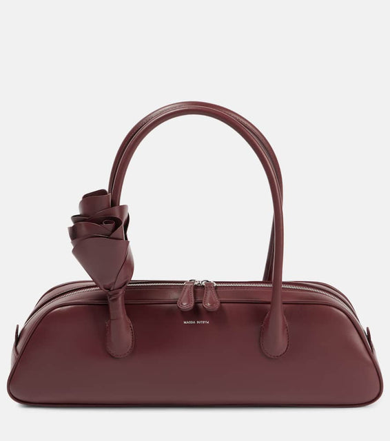 Magda Butrym Brigitte leather shoulder bag. Shop Magda Butrym Top-Handle Bags for women now.