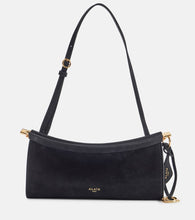 Alaia Curve Medium leather shoulder bag. Shop Alaia Shoulder Bags for women now.
