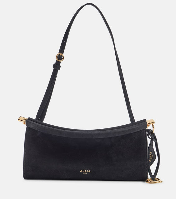 Alaia Curve Medium leather shoulder bag. Shop Alaia Shoulder Bags for women now.