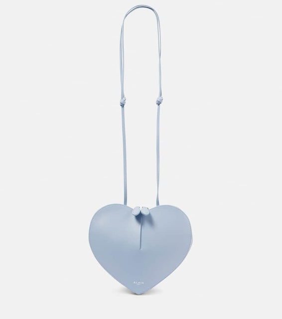 Alaia Le C√Ö¬ìur leather shoulder bag. Shop Alaia Crossbody Bags for women now.