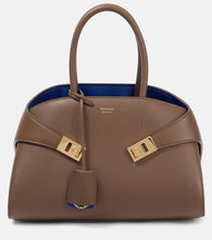 Ferragamo Hug Medium leather tote bag. Shop Ferragamo Top-Handle Bags for women now.