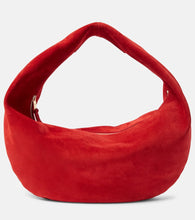 Khaite Olivia Medium suede shoulder bag. Shop Khaite Top-Handle Bags for women now.