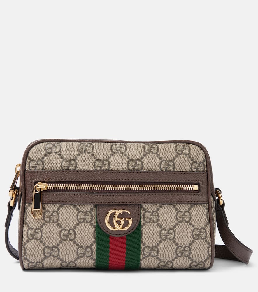 Gucci Ophidia GG Canvas Mini shoulder bag. Shop Gucci Crossbody Bags for women now.