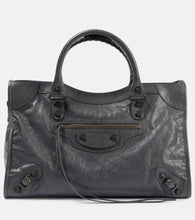 Balenciaga Le City Small leather tote bag. Shop Balenciaga Top-Handle Bags for women now.