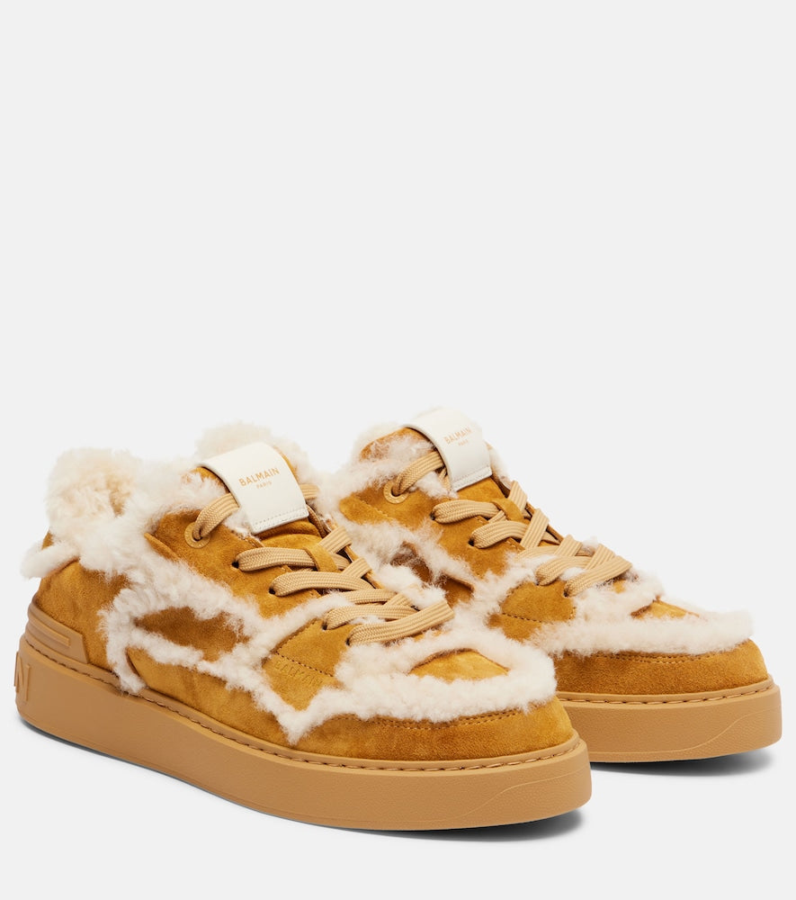 Balmain Shearling-trimmed suede sneakers