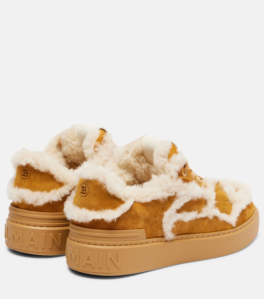 Balmain Shearling-trimmed suede sneakers