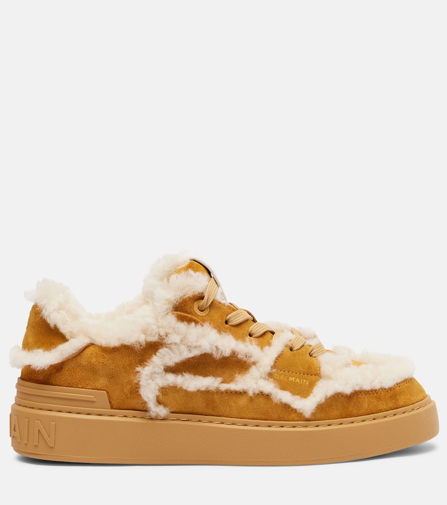 Balmain Shearling-trimmed suede sneakers