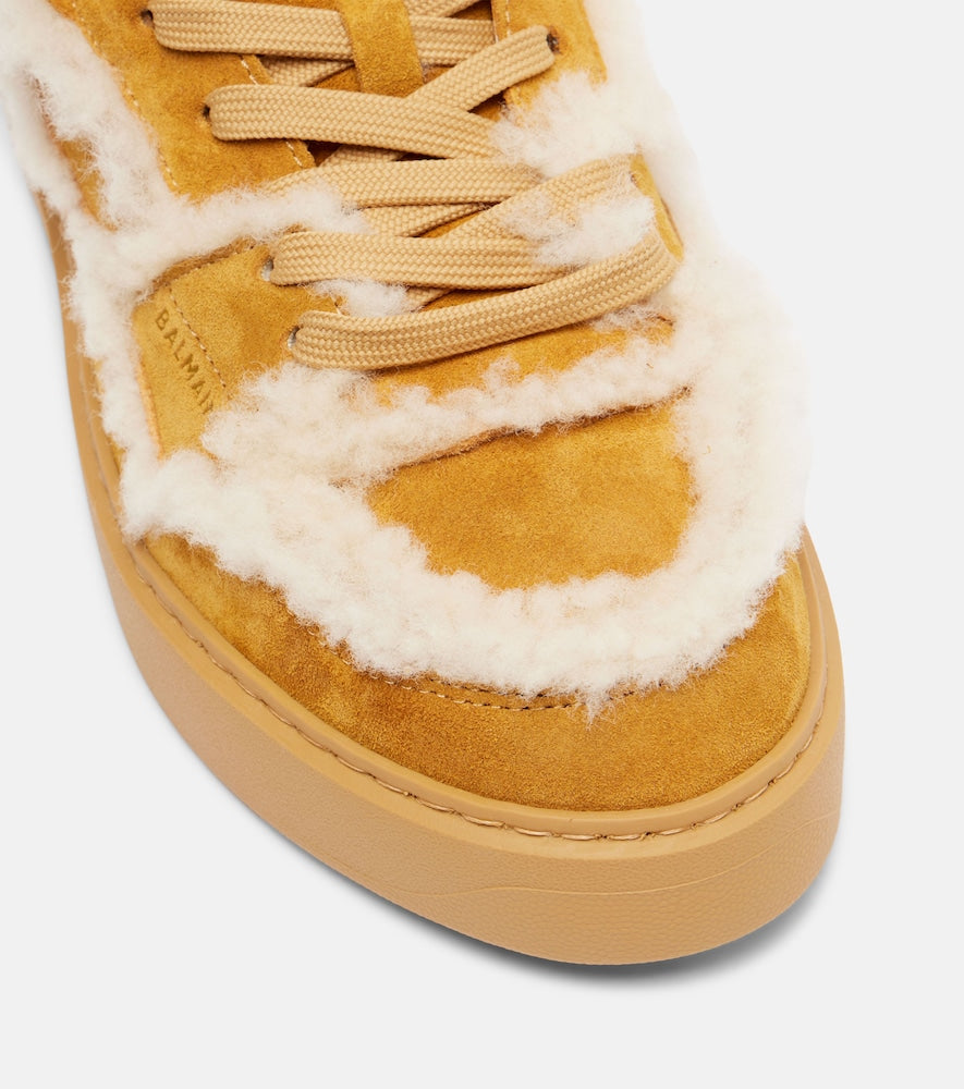 Balmain Shearling-trimmed suede sneakers