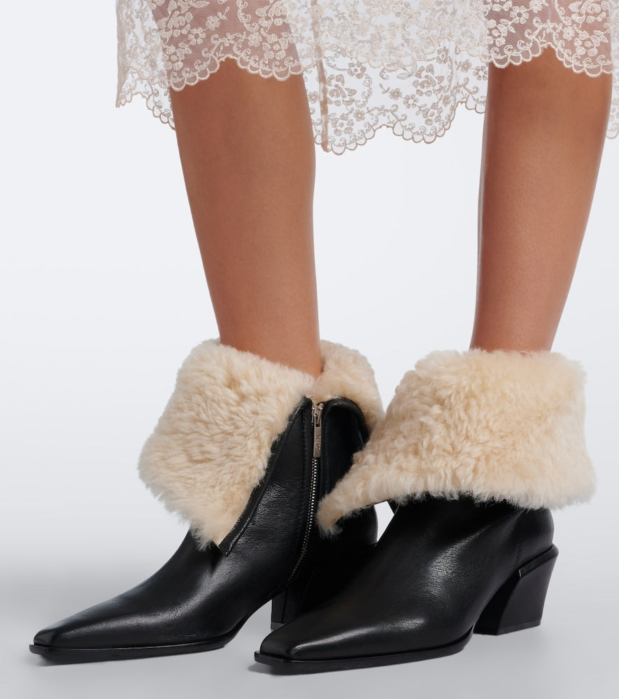 Paris Texas Bettina shearling-lined leather ankle boots in Black - Mid Heels