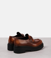 Prada Logo leather platform loafers