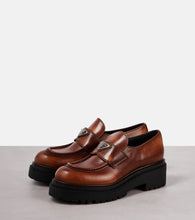 Prada Logo leather platform loafers