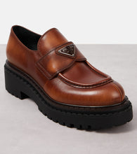 Prada Logo leather platform loafers