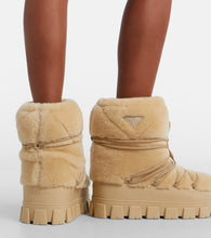 Prada Shearling and leather snow boots